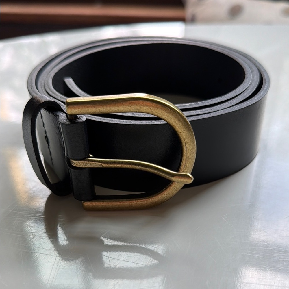 Black leather trouser belt with gold buckle